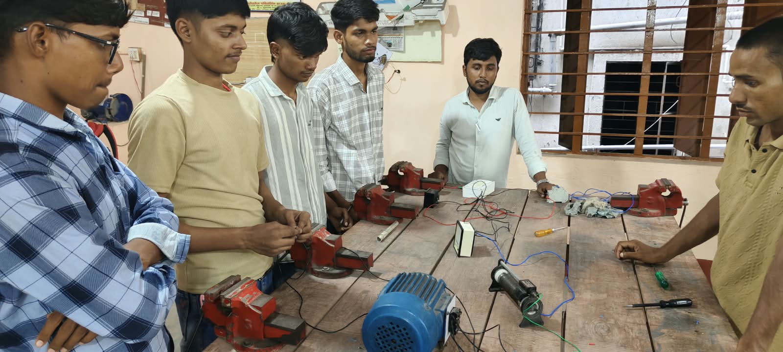 Students practicing electrical work